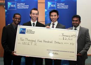 UOIT2 team accepts second-place prize at the CMA Ontario Case Competition. Team members (from left): Iskander Abubaker, Matthew Hook, John Oentoro and Arujunan Balakrishnan. 