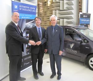 Handing over the keys (from left): Michael Angemeer, president and CEO, Veridian Corporation; Dr. Greg Rohrauer, assistant professor, Faculty of Engineering and Applied Science; and Dr. Ronald Bordessa, president, UOIT.