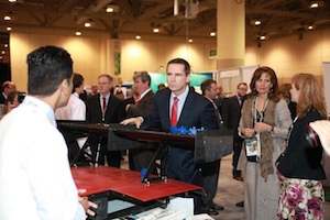 Premier Dalton McGuinty chats with UOIT Master of Science student Rishikesan Kamaleswaran at OCE Discovery 11