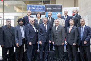 Back row (from left): Dr. Michael Owen, associate provost, Research, Ontario Tech University; Dr. Basma Shalaby president, UNENE; Dr. Jatin Nathwani, UNENE; Dr. Anthony Waker, Ontario Tech University; Dr. George Bereznai, dean, FESNS; and John Froats, Ontario Tech University. Front row (from left): Dr. Remon Pop-Iliev, Ontario Tech University; Dr. Tarlochan Sidhu, dean, FEAS; Dr. Richard Marceau, provost and vice-president, Academic, Ontario Tech University; Mark Elliott, chief nuclear engineer, OPG; Oshawa Mayor John Henry; Tibor Turi, manager, Research Partnerships Programs, NSERC; and Dr. Vijay Sood, Ontario Tech University. 