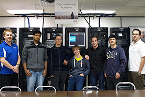 UOIT Cisco NetRiders team in the FBIT Networking Laboratory (from left): Adam Baran (lecturer), Yasir Jawed, Alexander Keller, Kyle Sugrue, Chris Weber, Brandon Laughlin and Josh Lowe (senior lecturer).