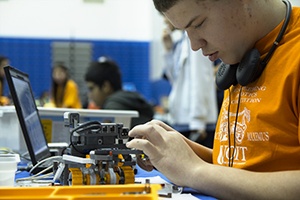 Competitor prepares chariot robot for battle at the 2011 UOIT Engineering Robotics Competition.