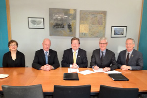 UOIT signs MOU with Dublin Institute of Technology in Ireland. Below right: UOIT signs MOU with Politecnico di Torino in Italy.