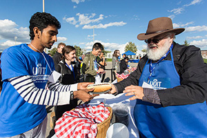 UOIT volunteers helping out at the Homecoming Weekend barbecue, September 2012.