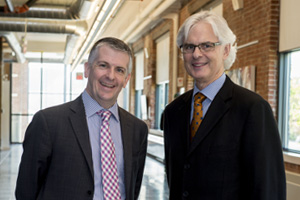 From left: John Whelton, Vice-President, North American Operations, Leading Edge Group; Dr. Tim McTiernan, UOIT President and Vice-Chancellor. Above: John Whelton (left) with Stephen Rose, Director, UOIT Management Development Centre. 