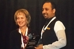 UOIT's Abu Arif, International Student Advisor (right), receives North Star Award from Karen McBride, President and CEO, Canadian Bureau for International Education (CBIE), at the CBIE's annual conference in Vancouver, B.C. 