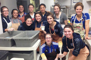 Members of UOIT's women's soccer team recently volunteered at St. Vincent's Kitchen by serving food, cleaning up after the meal and washing dishes.