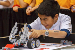FIRST LEGO League competitor prepares robot to carry out tasks at Ontario East provincial championships at the Campus Recreation and Wellness Centre.