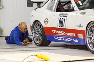 Kevin Carlucci, Technical Support Co-ordinator, ACE, helps prepare Mantis Racing's race car for aerodynamic testing.