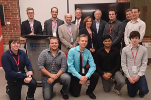 Ignite Power Panel with student-entrepreneurs who progressed to the next stage in the Ignite Competition. From left, back row: Joshua Tibando, Panda Insights; Andy Bruce, Co-Founder and CEO, MobileXCo; Steve Rose, Associate Dean, FBIT, UOIT; Don Lovisa, President, Durham College; Heather McMillan, Executive Director, Durham Workforce Authority; Michael Owen, Vice-President, Research, Innovation and International, UOIT; Michael Veneziano, Tony Veneziano and Daniel Veneziano, Turnkey. Front row: Tom Ross, Global Energy Initiative; Eric Bochmeier and Daniel Cole (DC students), FilmBuffer; Timothy Sarvendran, Turnkey; and Andrew Guthrie, Games For Education.