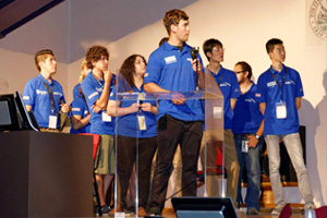 Christopher Janotta (at podium) presented the team's project; Xu (Mike) Zhang is on the far right.