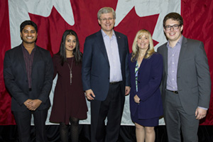 Members of the Artemis Research Team meet with the Prime Minister in Markham, Ontario. From left: Anirudh Thommandram, BEng and MEng graduate, Ontario Tech University; Tanvi Naik, Ontario Tech University graduate student, Health Informatics; Prime Minister Stephen Harper; Dr. Carolyn McGregor, Ontario Tech University's Canada Research Chair in Health Informatics; Robert Greer, Ontario Tech University graduate student, Computer Science.