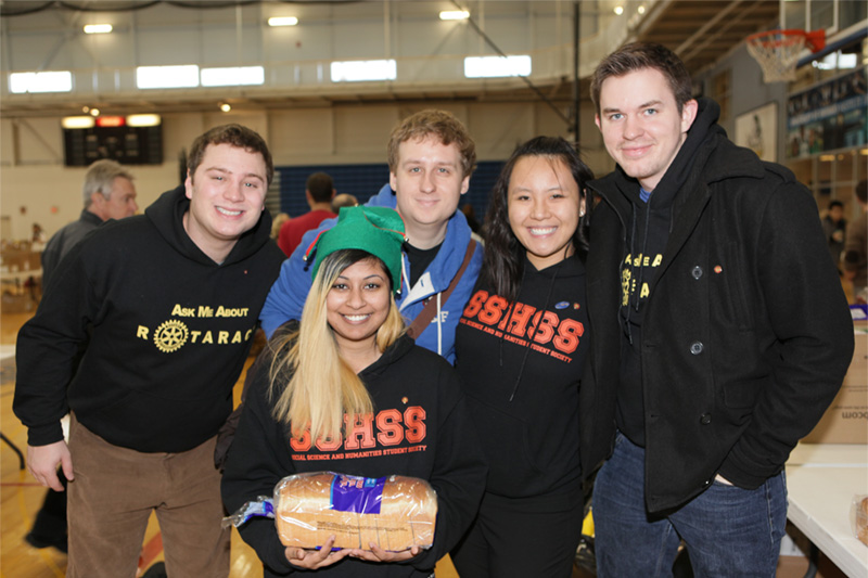 Volunteers helping with the December 2014 campus Holiday Food Drive