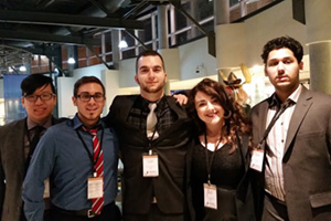 Team UOIT at the 2015 Rotman International Trading Competition (from left): William Lee, Gianfranco Ingratta, Chris Kerschbaumer, Rachel Wollison and Pherroz Ansari. Below right (from left): Jonathan Yang, William Lee, Chris Kerschbaumer and Gianfranco Ingratta. 
