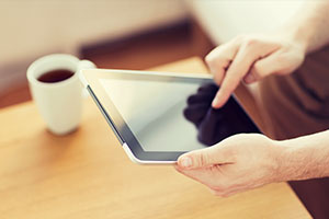 Person using tablet to access the internet