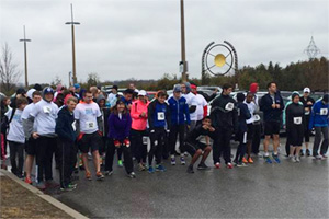 Participants lining up outside the Campus Recreation and Wellness Centre for the start of the 2015 Campus Charity Walk and Run to support the Boys and Girls Club of Durham.