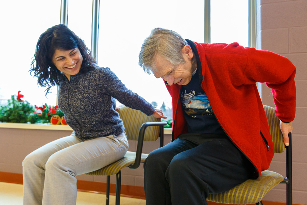 Dr. Shilpa Dogra with one of fitness program participants at the Oshawa Senior Citizens Centre.