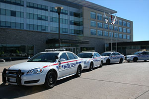 DRPS cars in front of the Regional Municipality of Durham headquarters.