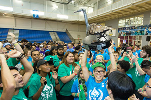 Faculty of Science students celebrate winning the Wild Goose Chase Trophy at 2014 Orientation.