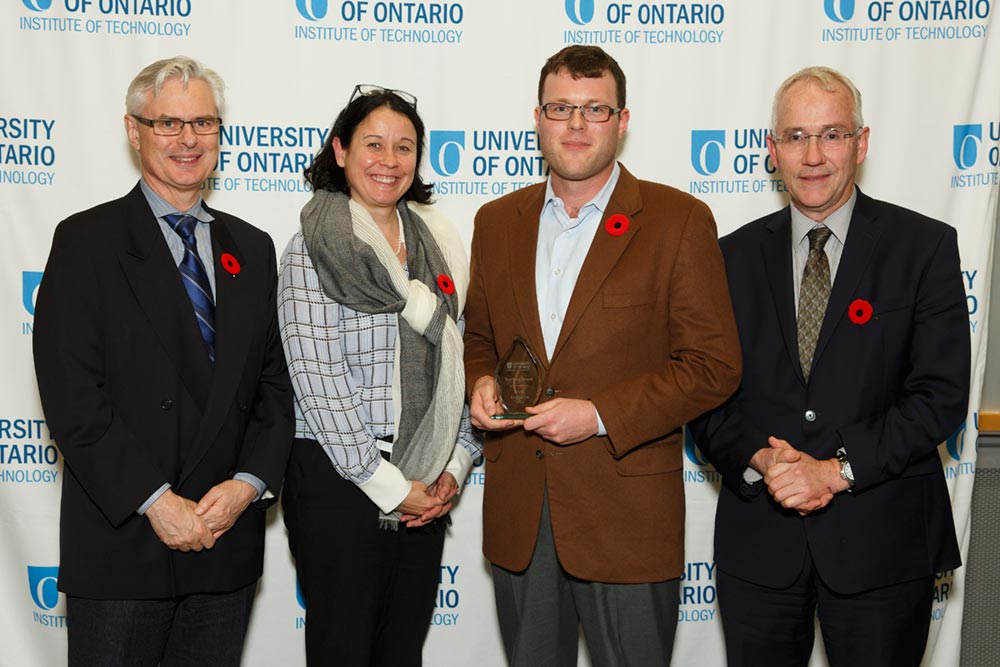 Teaching Excellence Award (Tenured and Tenure-Track): Dr. Isaac Tamblyn (third from left)