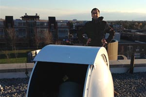 Dr. Rupinder Brar overseeing installation of the Faculty of Science's new reflecting telescope on top of the Campus Library at the University of Ontario Institute of Technology's north Oshawa location.