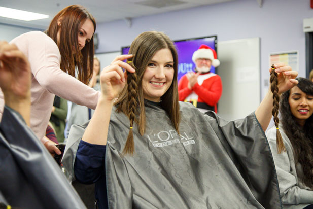 Bachelor of Education students cut hair for charity in support of Angel Hair for Kids campaign (Education Building, December 16, 2015).