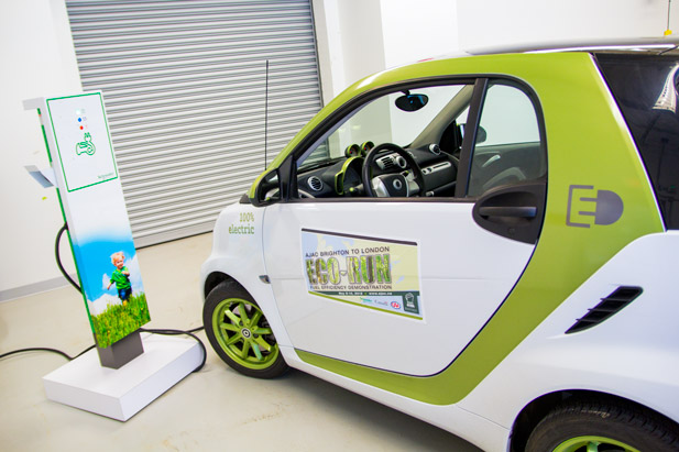 Electric vehicle charging at ACE during the inaugural AJAC EcoRun event at UOIT in May 2012.