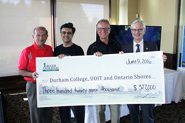 From left: Roger Anderson, Chairman and CEO, Region of Durham; Karim Mamdani, President and CEO, Ontario Shores Centre for Mental Health Sciences; Don Lovisa, President, Durham College; and Tim McTiernan, President, UOIT receive funds raised during this year’s Roger Anderson Charity Classic golf tournament.