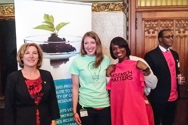 Council of Ontario Universities' pop-up research park, Parliament Buildings, Ottawa (May 18, 2016). From left: Kim Rudd, Northumberland-Peterborough South MP; Elysabeth Reavell-Roy, UOIT PhD student (Applied Bioscience); Celina Caesar-Chavannes, Whitby MP.
