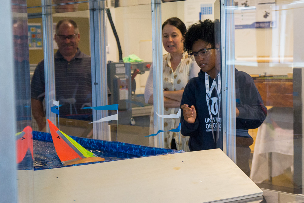 UOIT Provost Dr. Deborah Saucier observes BHS students’ sailboat design activities.