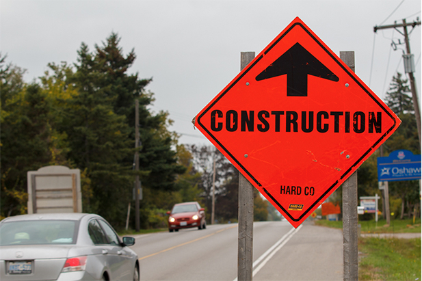 Orange construction sign on an Oshawa road