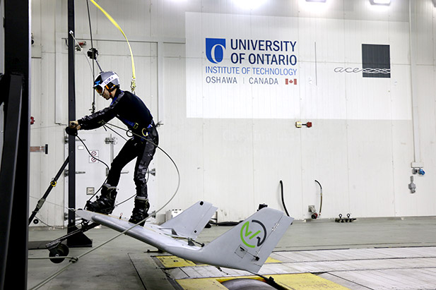 Taking flight: Testing the Wyp Wingboard in front of the nozzle of the powerful ACE Climatic Wind Tunnel.