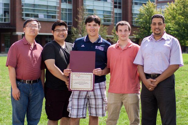 From left: Dr. Yuelei Yang, Senior Lecturer, FEAS; Kevin Luu (Mechanical Engineering); Daniel Henning (Automotive Engineering); Liam Ready (Mechanical Engineering); Dr. Atef Mohany, Associate Professor, FEAS. Inset image: Computer-aided design of Opal reconfigurable vehicle.