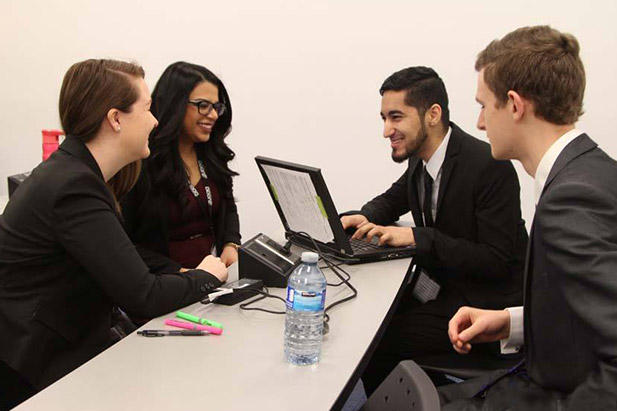 For the UOAA Connect Conference case competition, participants split into teams of four to tackle strategic decision-making scenarios.