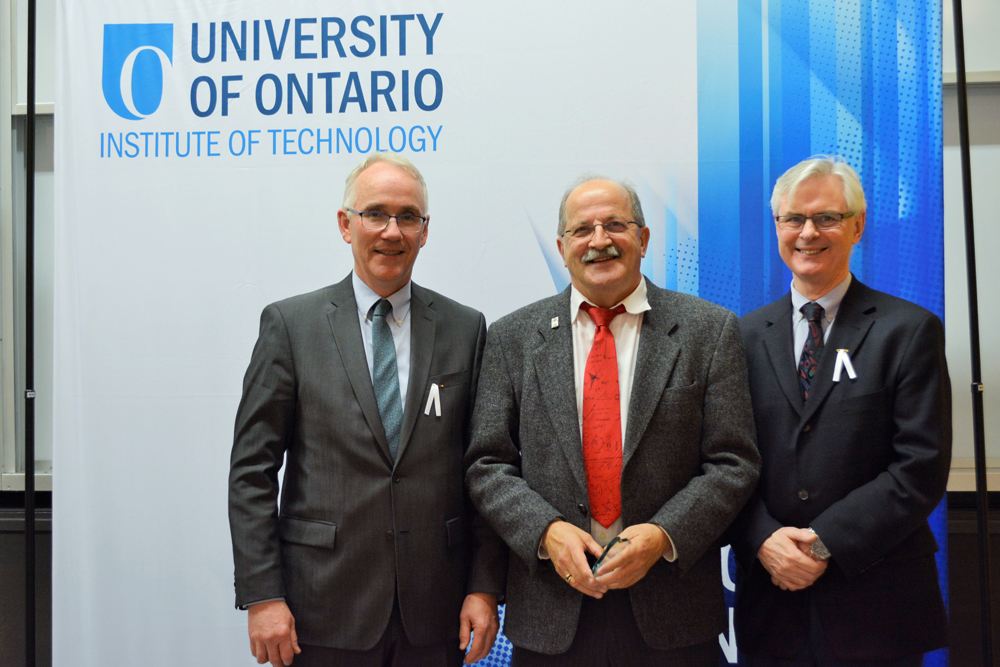 Teaching Excellence Award (Teaching Assistant): Ronald Bell, Faculty of Science (with Robert Bailey, Associate Provost; and President McTiernan).