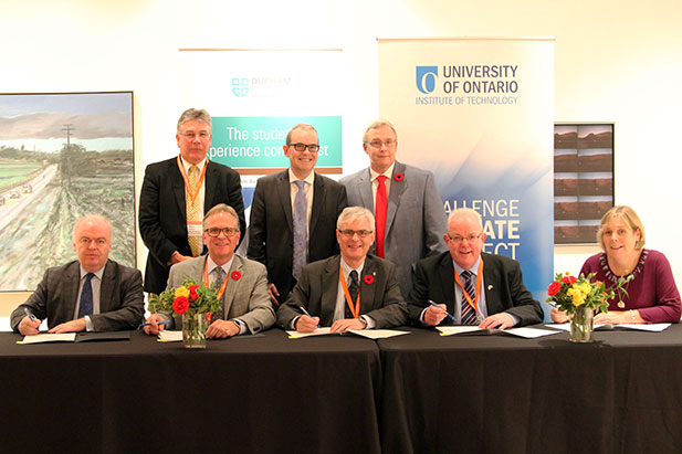Participants at the Higher Education in Transformation Symposium sign Memorandum of Agreement to create the Canada-Ireland Centre for Higher Education Policy and Practice.