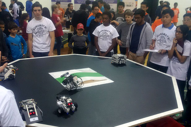 'Sumobot' battle during the 2016 high school Engineering Robotics Competition hosted and organized by the university's Faculty of Engineering and Applied Science.