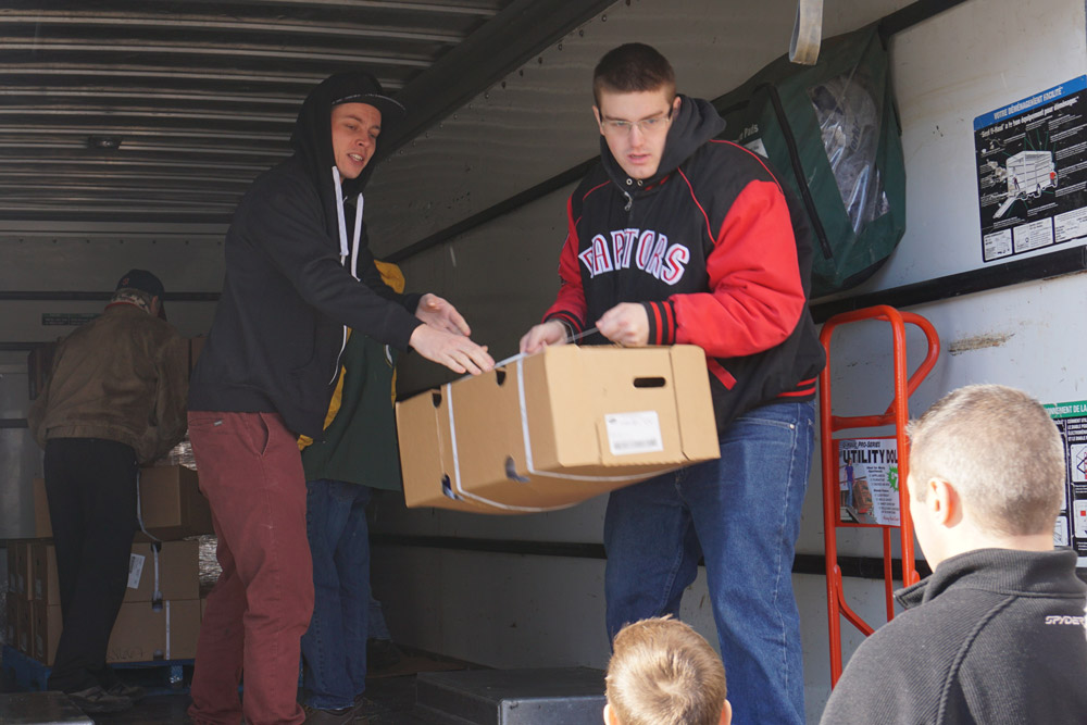 Volunteers helped deliver hampers to student families.
