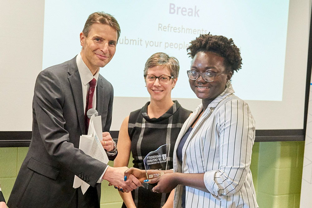 3MT winner Ololade Sanusi (right) with Dr. Langis Roy, Dean, Graduate Studies (left) and Jennifer Turner, Business Manager, Covanta Durham-York Renewable Energy.