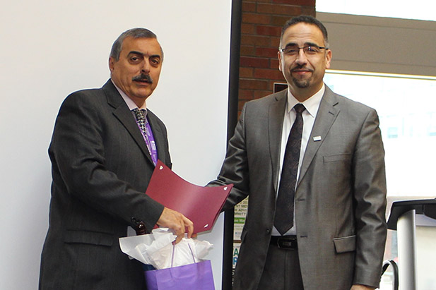 Mr. Saad Dahdouh, Technology and Research Manager, Ontario Power Generation (left) with Dr. Hossam Kishawy, Interim Dean, Faculty of Engineering and Applied Science.