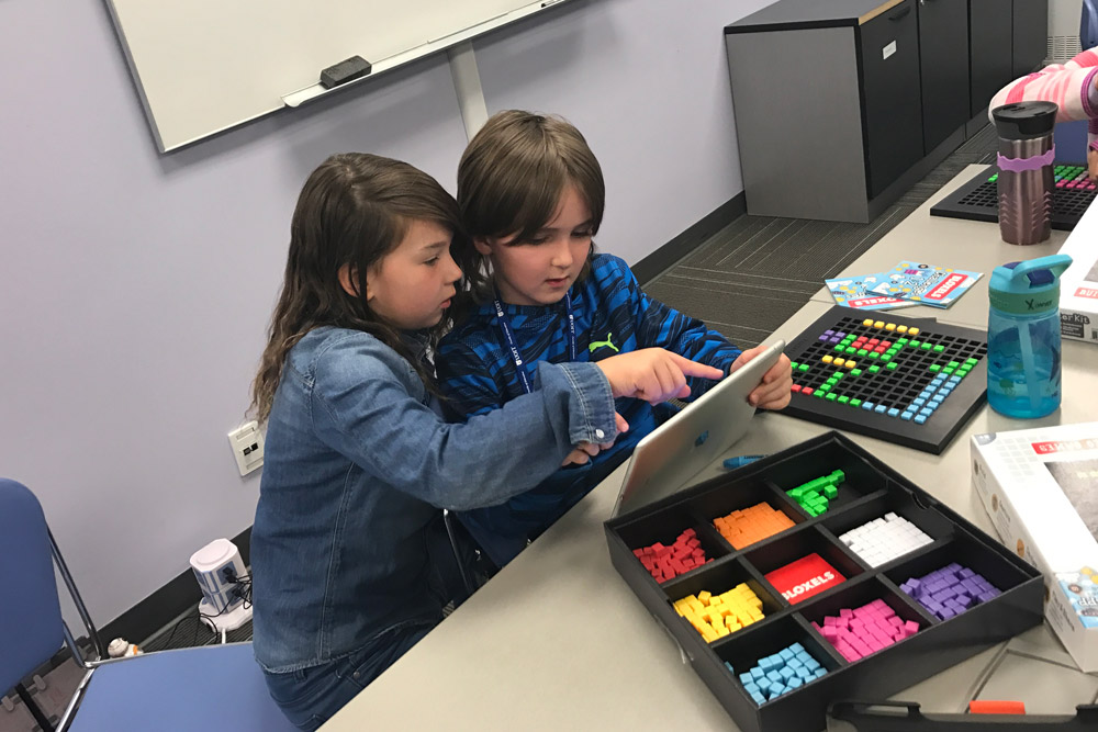 Students used innovative tools like Bloxels, a video game-creation platform.