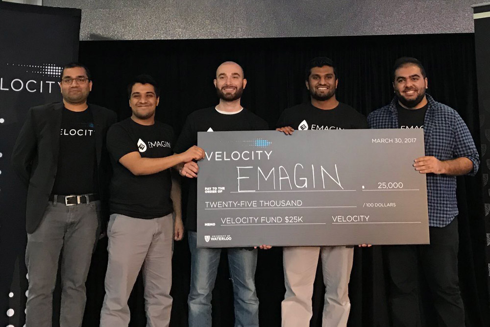 Mohamad Vedut (middle) celebrates with EMAGIN colleagues at the 2017 Velocity fund Finals.