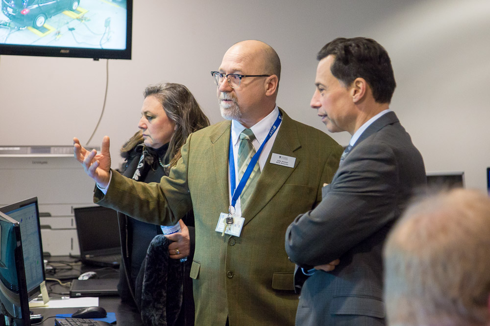 The Honourable Brad Duguid, Minister of Economic Development and Growth chats with John Komar, Director, Engineering and Operations, ACE during campus visit on March 15, 2017.