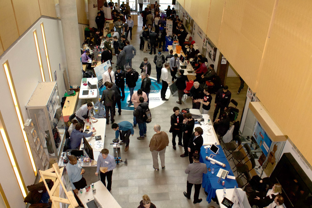 Overview image of students and attendees at the FEAS Capstone Exhibition and Competition