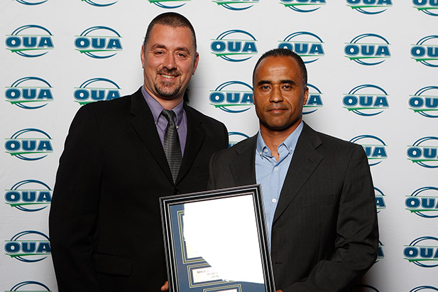 Peyvand Mossavat (right), Head Coach, UOIT Ridgebacks women's soccer team was named OUA Male Coach of the Year at the OUA Honours and Awards Banquet in Huntsville, Ontario. Right: Scott Barker, Athletics Director, University of Ontario Institute of Technology. 