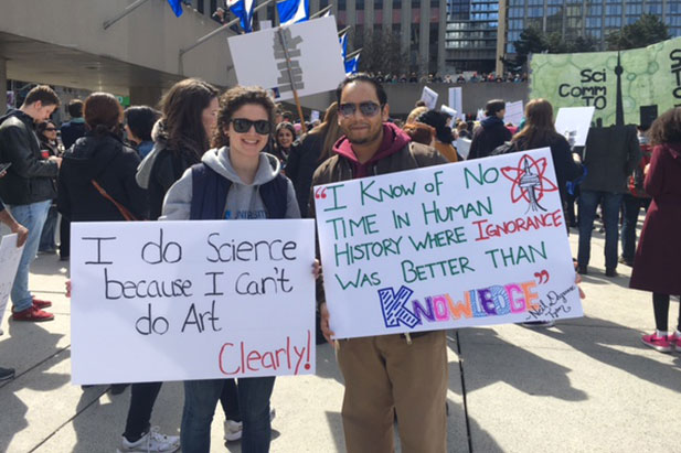 From left: Carley O’Neill, PhD candidate (Applied Bioscience), Faculty of Science; and David Jagroop,  Master of Health Sciences (Kinesiology) candidate, Faculty of Health Sciences, at the March for Science in Toronto, Ontario (April 22, 2017).