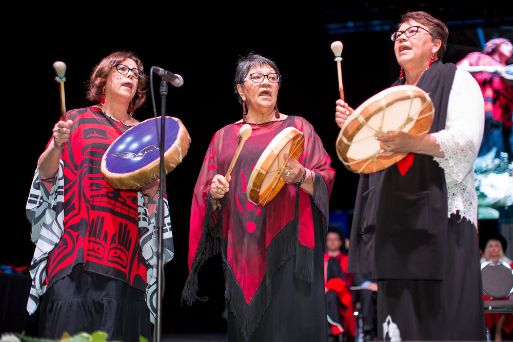 The Debwewin Sisters (Jamie Kozlinsky, Fay Koss and Jill Thompson) perform Indigenous drumming during smudging ceremony.