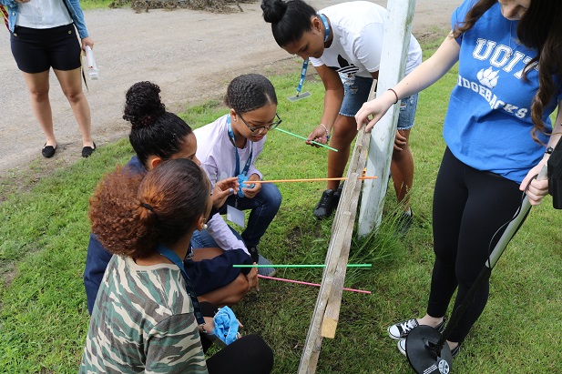 Bermuda High School students participate in mock scenario investigations at the university's Crime Scene House.