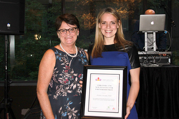 Dr. JoAnne Arcand, Assistant Professor, Faculty of Health Sciences, University of Ontario Institute of Technology (right), receives the 2017 New Investigator Partnership Prize at the Canadian Nutrition Society Awards Banquet in Montreal, Quebec from Dr. Mary L'Abbe, Professor and Chair, Department of Nutritional Sciences, University of Toronto (May 27, 2017).