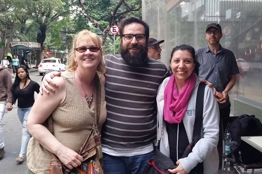 Dr. Allyson Eamer (left) and Anna Rodrigues (right) with journalist Diogo Rodriguez (middle), one of the group's guide/educators in São Paulo.
